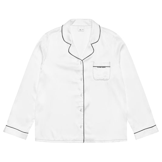 Women’s long sleeve pajama top in silky fabric with relaxed fit, chest pocket, and decorative piping detail